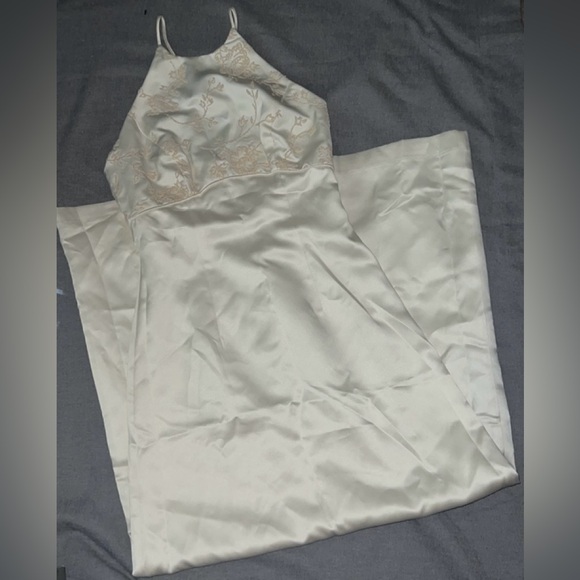 Ivory/cream dress with spaghetti straps and a zipper in the back. Gently used. - Picture 7 of 11